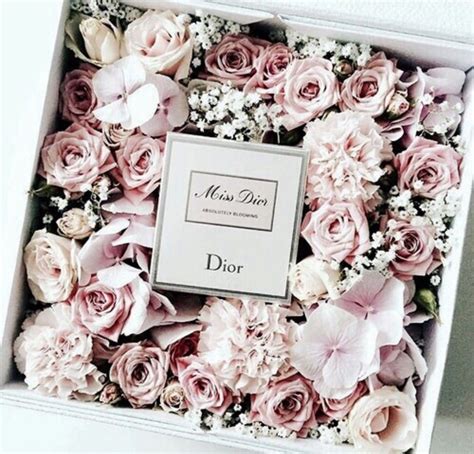 dior with flowers|dior flower vase.